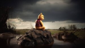 winnie the pooh sitting on a rock sad and alone