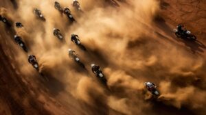A captivating dirt bike race snapshot from above showcasing the thrilling pandemonium as bikers race through a dirt track