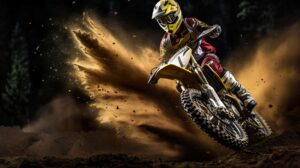 Action shot of a dirt bike mid jump, with dirt particles suspended in the air, capturing the thrill of off road riding