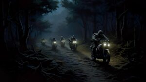 Wallpaper showcasing riders embarking on an exhilarating dirt bike expedition under the cover of darkness guided solely by their headlights