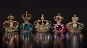 Crown jewels in a symmetrical arrangement, emphasizing their regal and dazzling quality