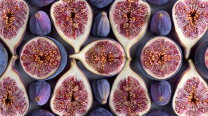Fresh figs meticulously arranged in a symmetrical design lending elegance to your wallpaper selection