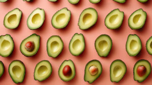 Symmetrically arranged avocado halves create an aesthetically pleasing wallpaper as seen in avocado halves arranged in an aesthetically pleasing and symmetrical pattern.jpg