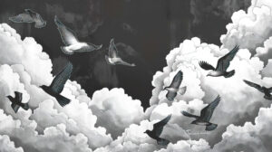 Birds dance in the sky black and white hues blending seamlessly to create mesmerizing patterns against the cloudy backdrop in Graceful Avian Silhouettes.jpg