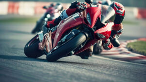 Experience the thrill of a high speed motorcycle race as riders lean into sharp turns on a challenging track