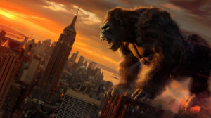A thrilling wallpaper capturing King Kong defiantly roaring from atop a tall skyscraper overlooking the city skyline below