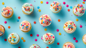 A cheerful design featuring cupcakes with colorful sprinkles, set against a light blue background for a fun and festive feel
