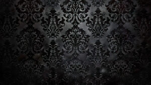 Gothic lace patterns and Victorian style frames adorn an elegant wallpaper showcased against a deep black background in this file named vintage wallpaper.jpg