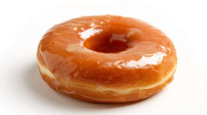 A classic glazed donut with a shiny, sweet coating, set against a white background for a simple and delicious look