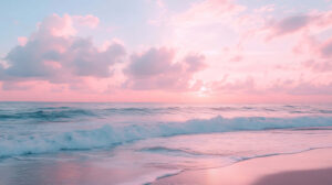 A tranquil wallpaper captures a serene beach setting with pastel skies gentle waves and soft pink clouds at sunset in the background